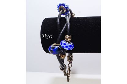 Array of Blue Lamp Work Leather Bracelet